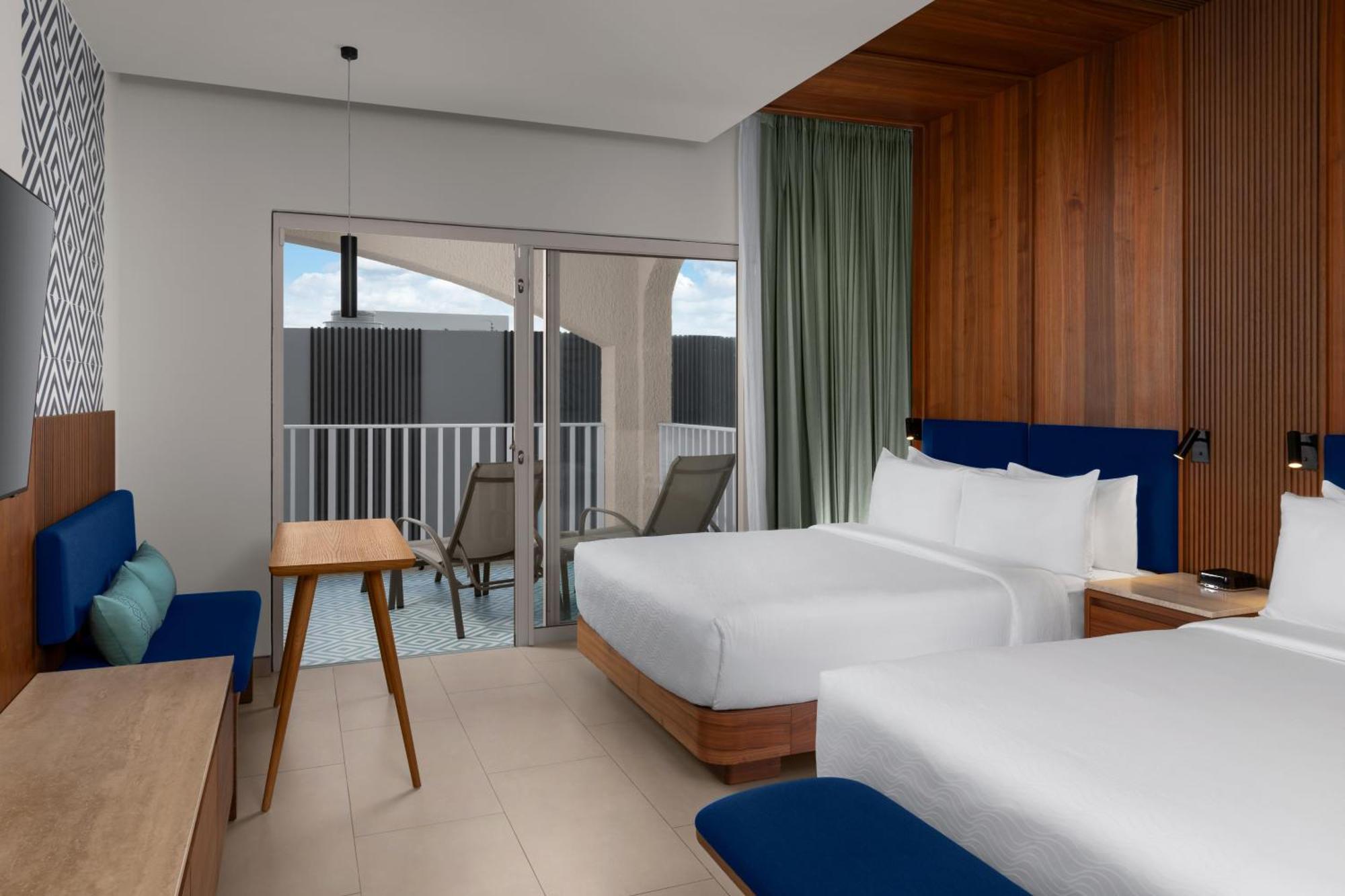 Queen Room with Two Queen Beds and Resort View